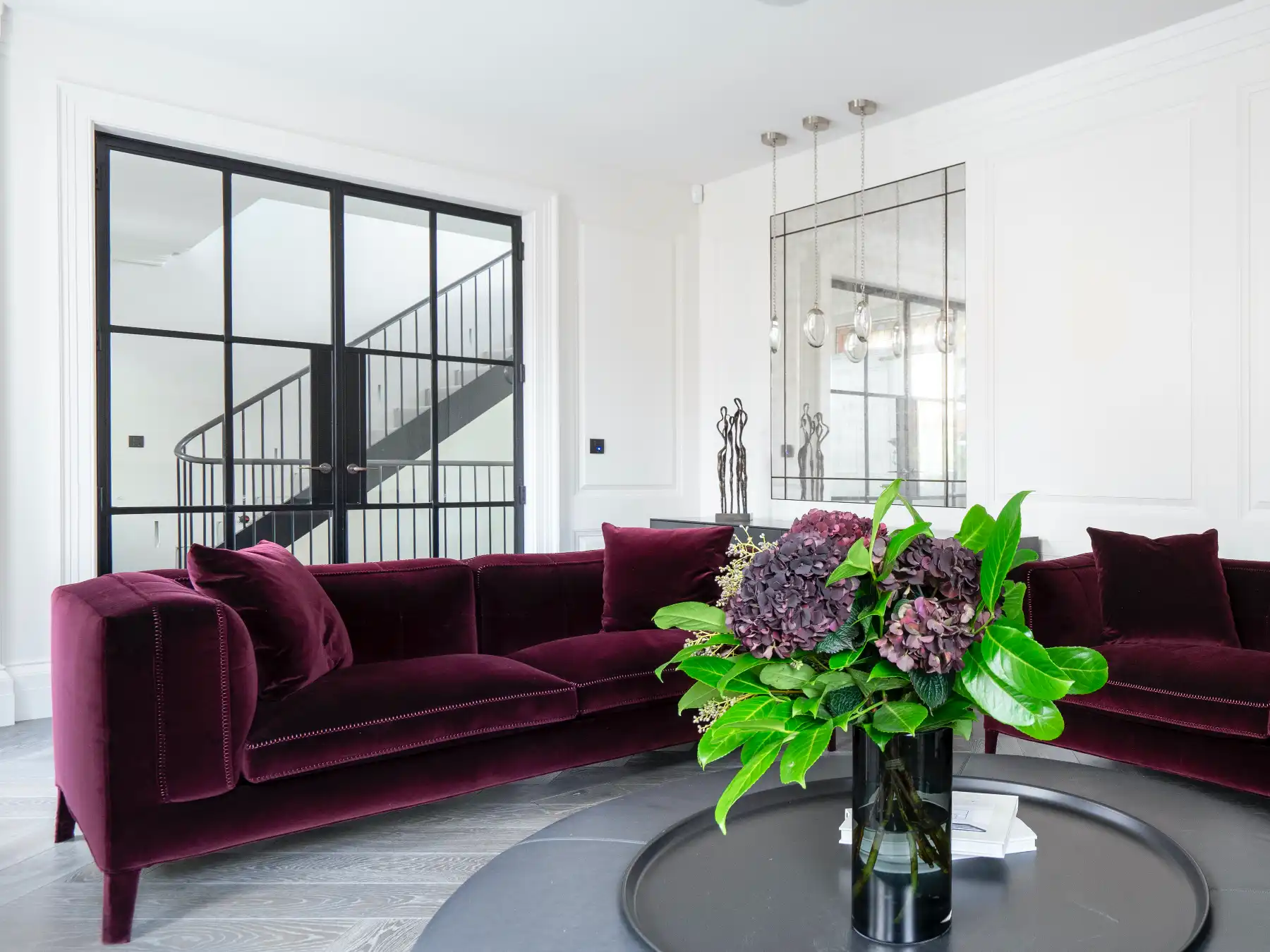 Crittall approved installer fitting bespoke steel glazing in Manchester